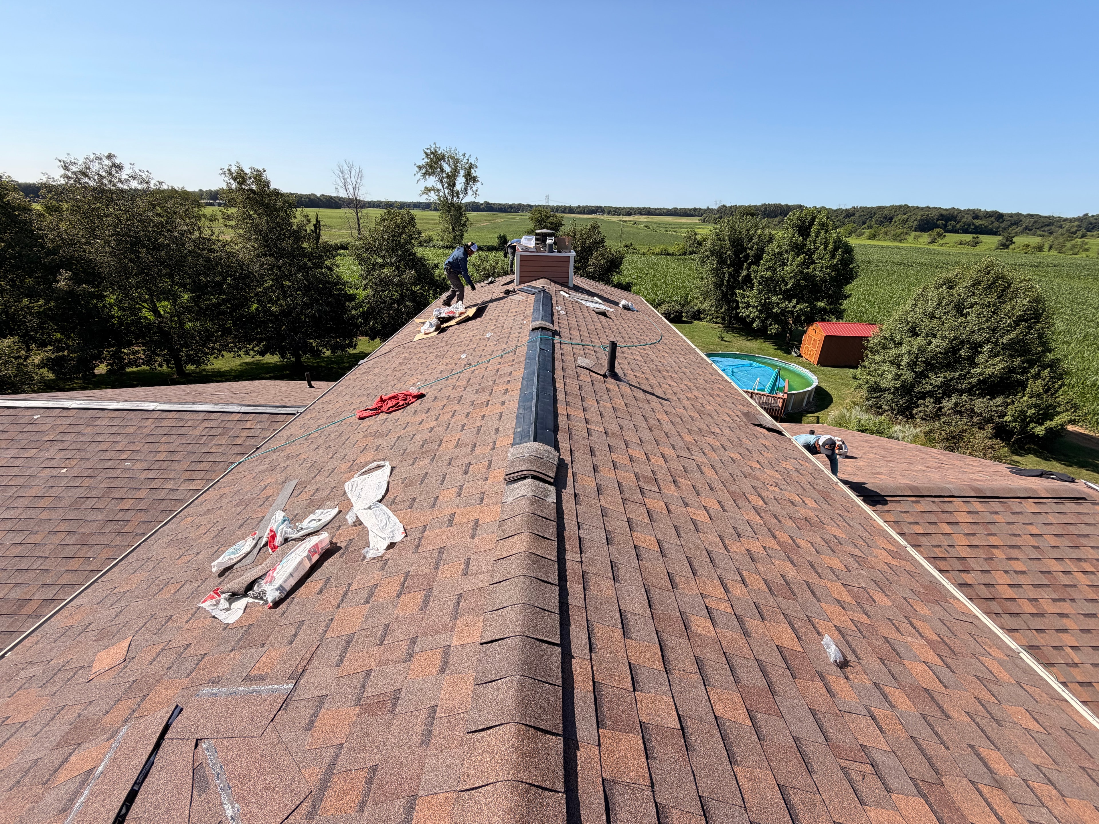 Underdog Roofing crew working on a roof